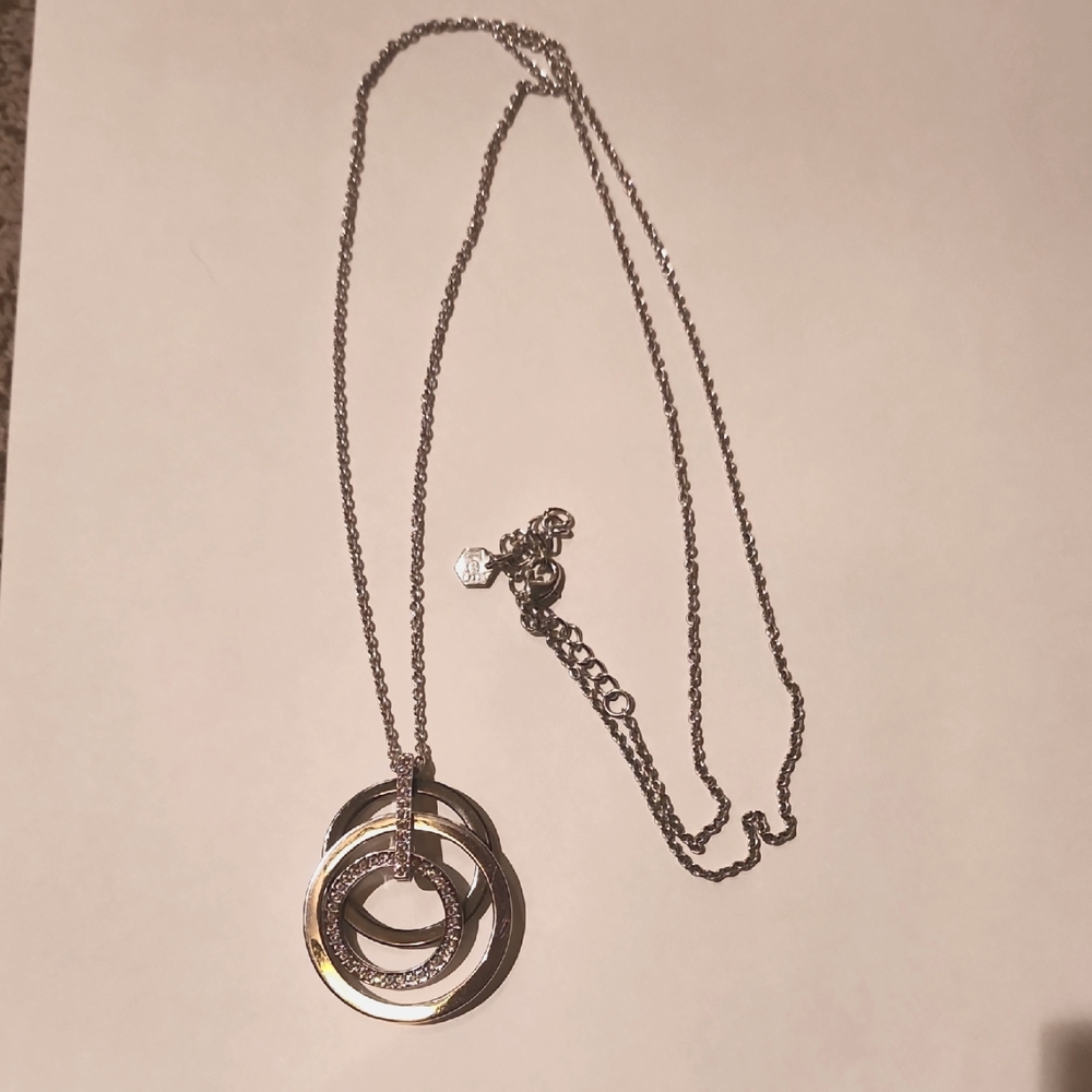 Elegant Silver And Crystal Pendant Necklace